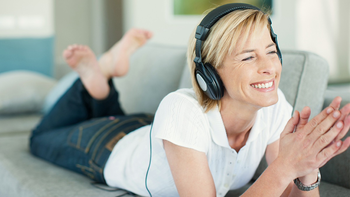 Woman listening to headphones
