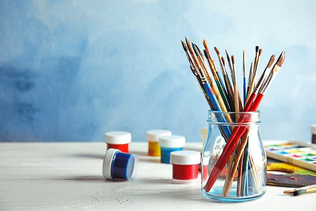Paint and sip party: art supply station on tabletop