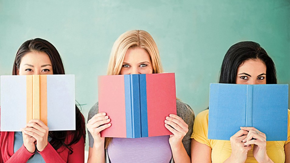 Best book club books: featured image of three women holding up books