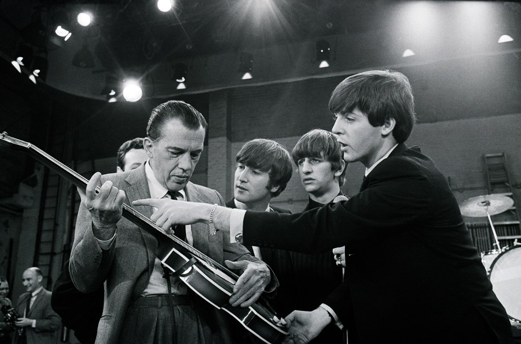 The Beatles with Ed Sullivan, the man who introduced Beatlemania to the world on February 9, 1964