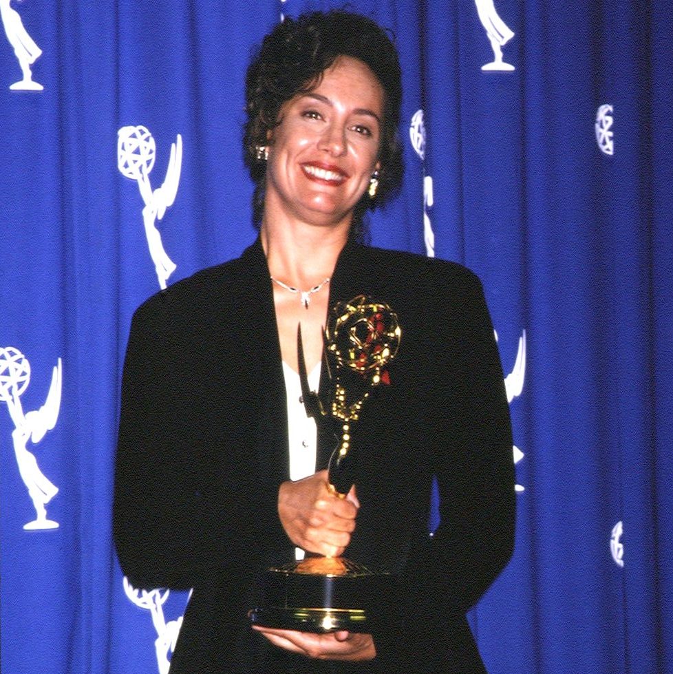 Laurie Metcalf holding an Emmy Award, 1994