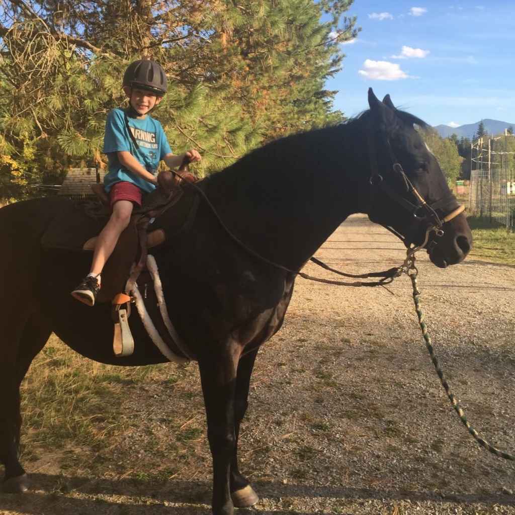 My Guardian Angel Mica with child horse-back riding