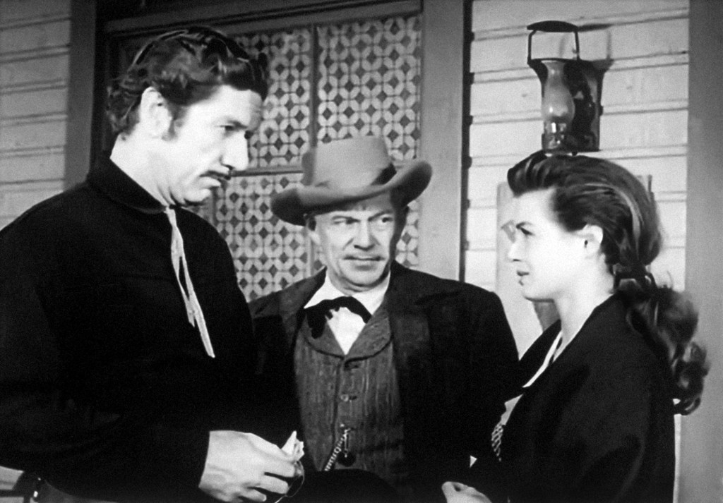 Richard Boone, Willis Bouchey and Angie Dickinson in an episode of Have Gun Will Travel