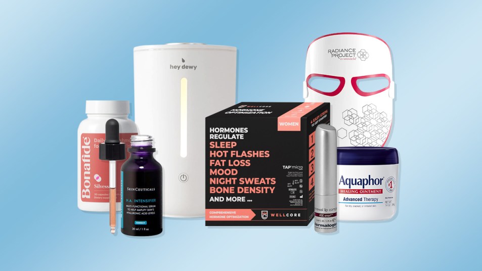 Winter skincare products for older women recommended by dermatologists arranged in front of an icy blue background.