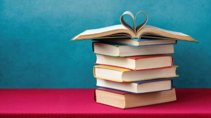 Romance authors: featured image love of books stack 1