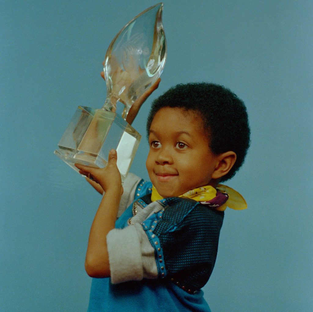 Emmanuel Lewis holding a People's Choice Award, 1985