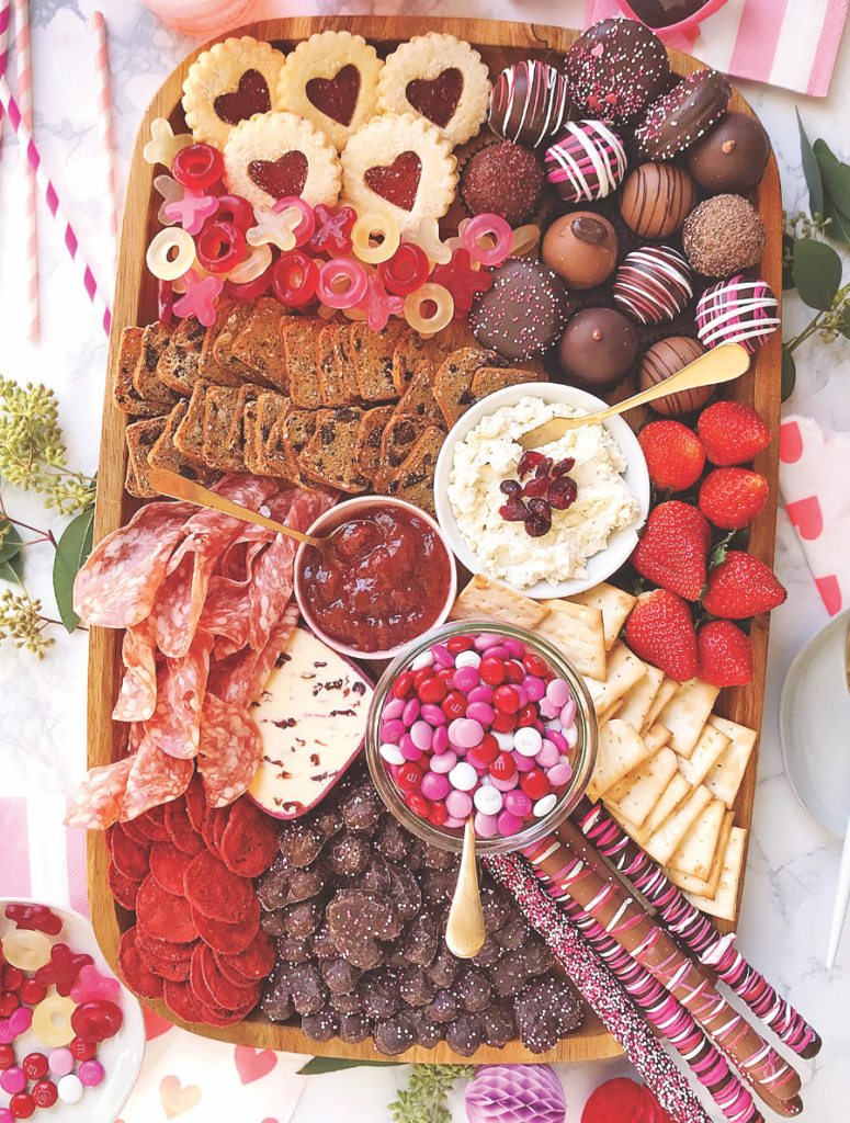 Dessert boards: sweet and savory dessert board on table