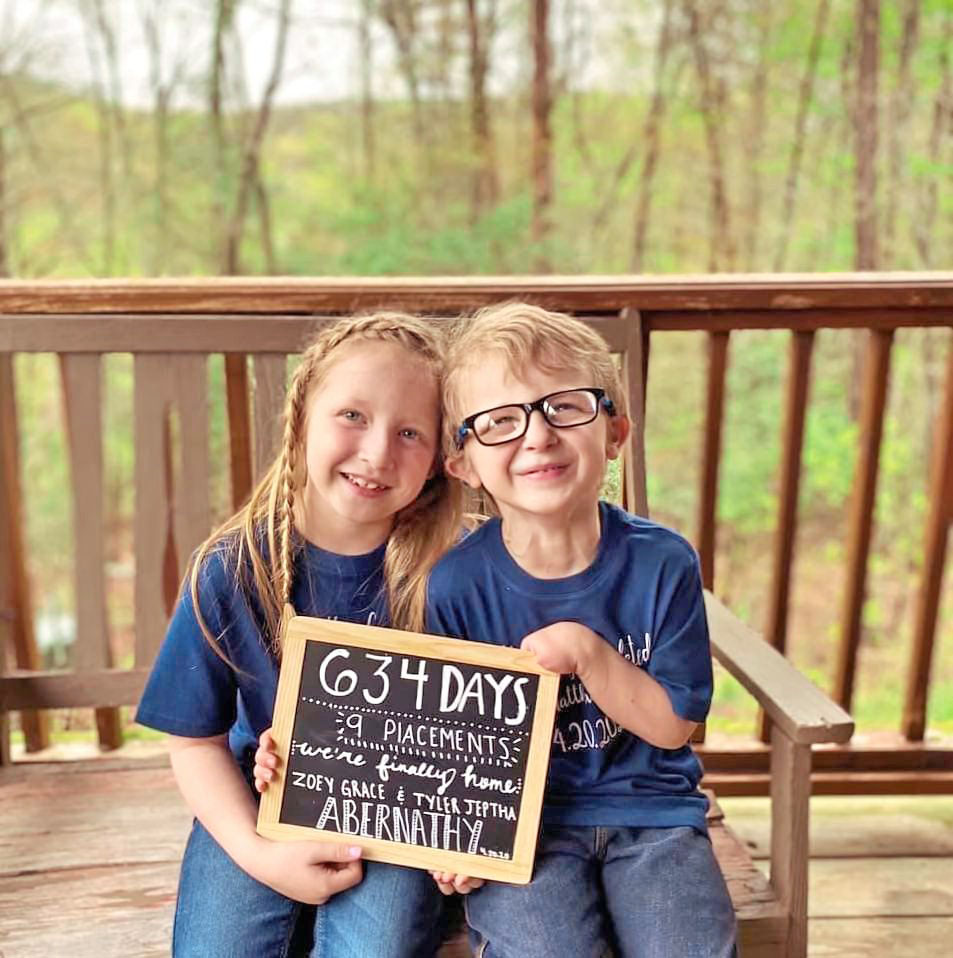 Tyler (right) with sister Zoey on adoption day in April of 2020