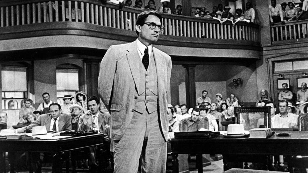man standing in a court room; gregory peck movies