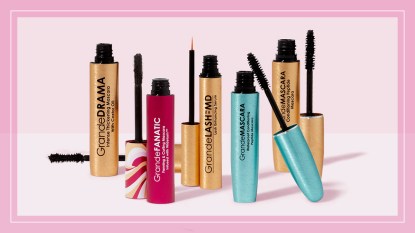 GrandeLASH-MD products including their best-selling lash growth serum and mascaras set on a pink background.