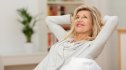 Woman relaxing at home and smiling