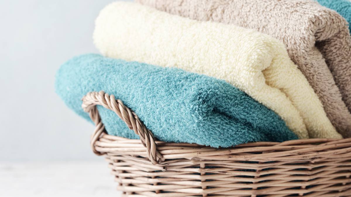 8 Genius Ways to Fold Towels That Save Space in a Closet and Look Neat in a Bathroom