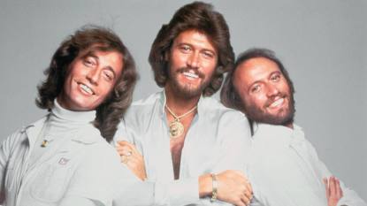 Bee Gees posed back to back