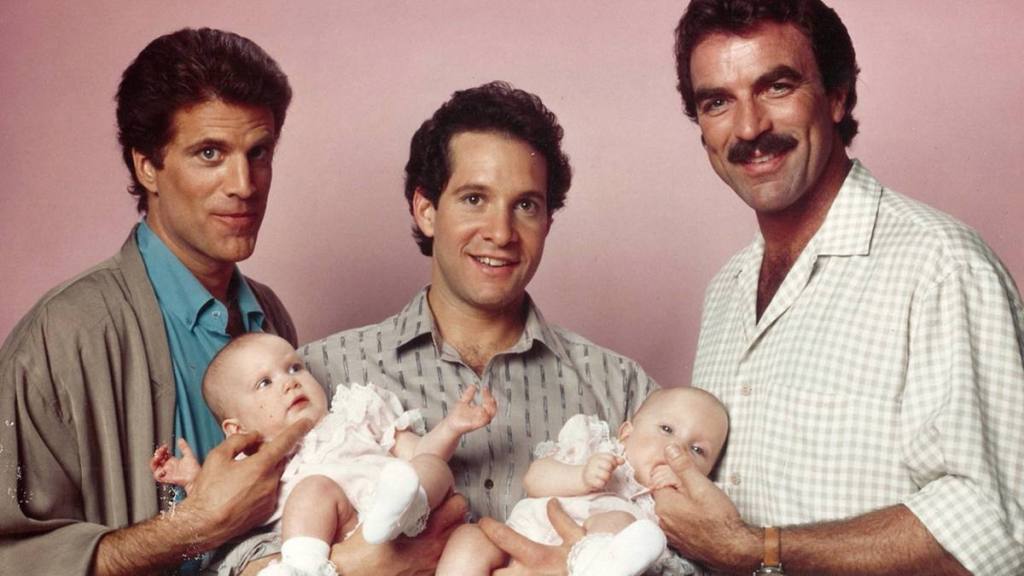 Three men and two babies
