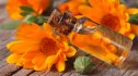 Calendula oil in a glass bottle