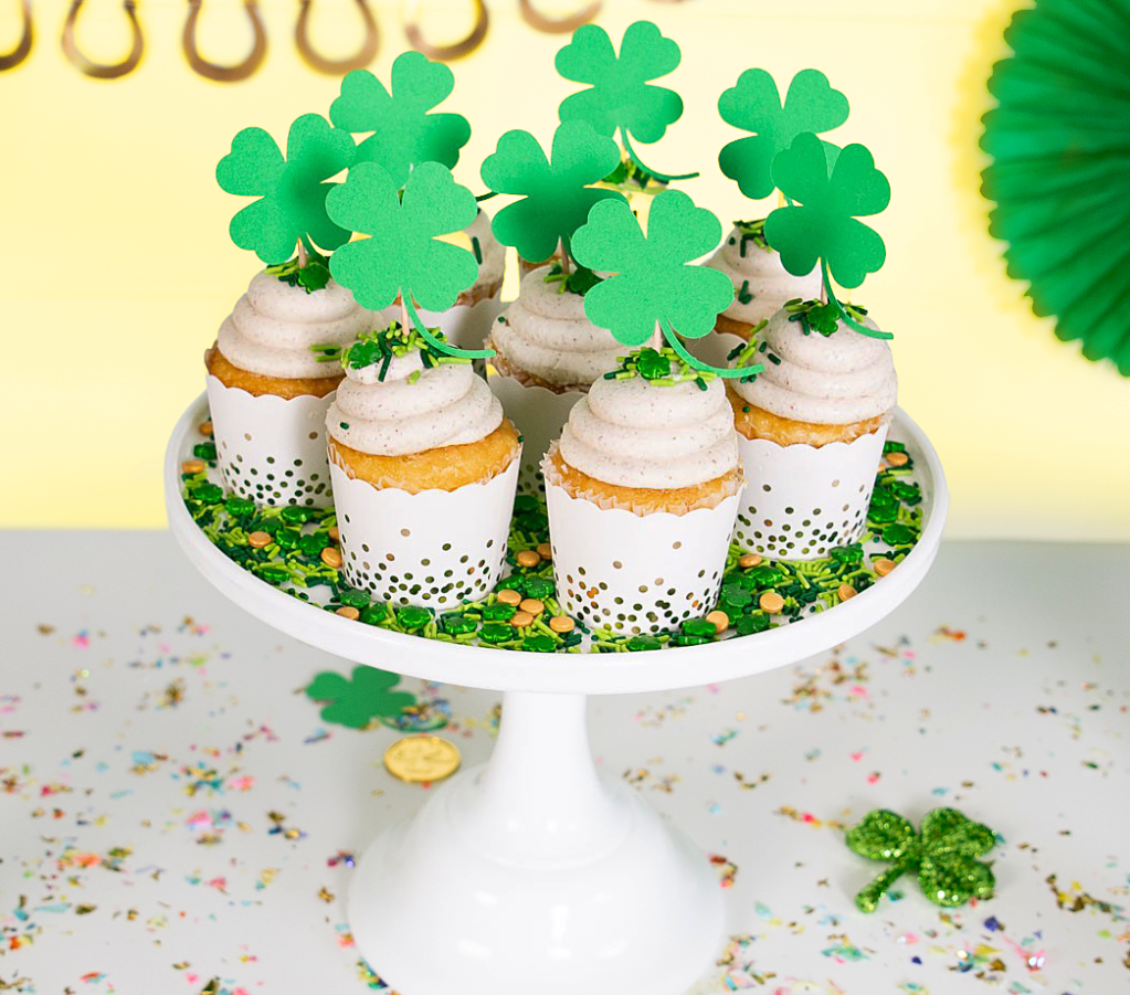 st patrick's day party: Festive St Paddy's Day cupcakes on pedestal plate