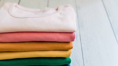 A nice stack of clothes when learning how to fold shirts to save space