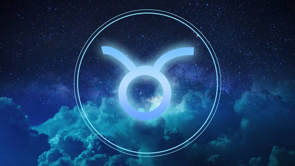 Taurus Zodiac Sign on a colorful background light