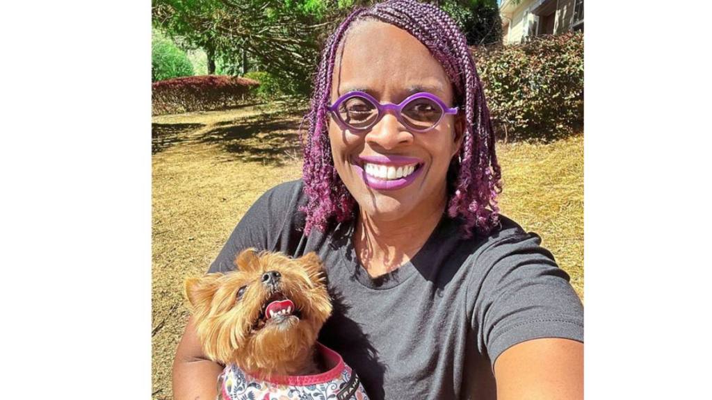 Highest paying work from home jobs: Orazie Cook smiles with her dog