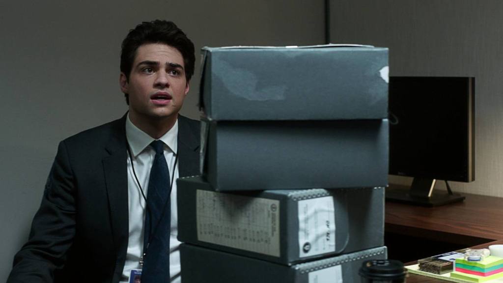 Man with a pile of files; legal dramas on netflix