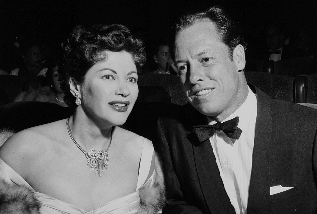 CIRCA 1955: Actress Yvonne De Carlo with husband Robert Morgan attends a premiere