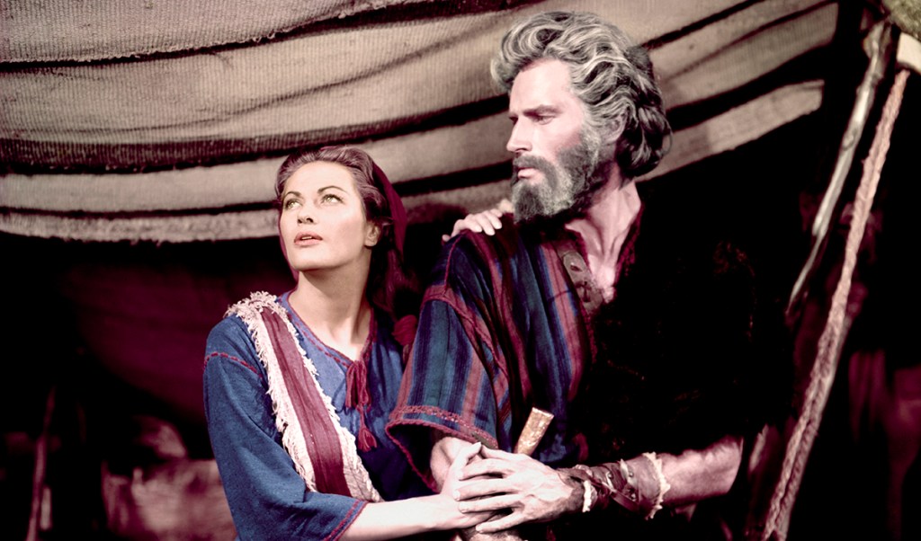Yvonne De Carlo and Charlton Heston on the set of  1956's The Ten Commandments, directed by Cecil B. DeMille