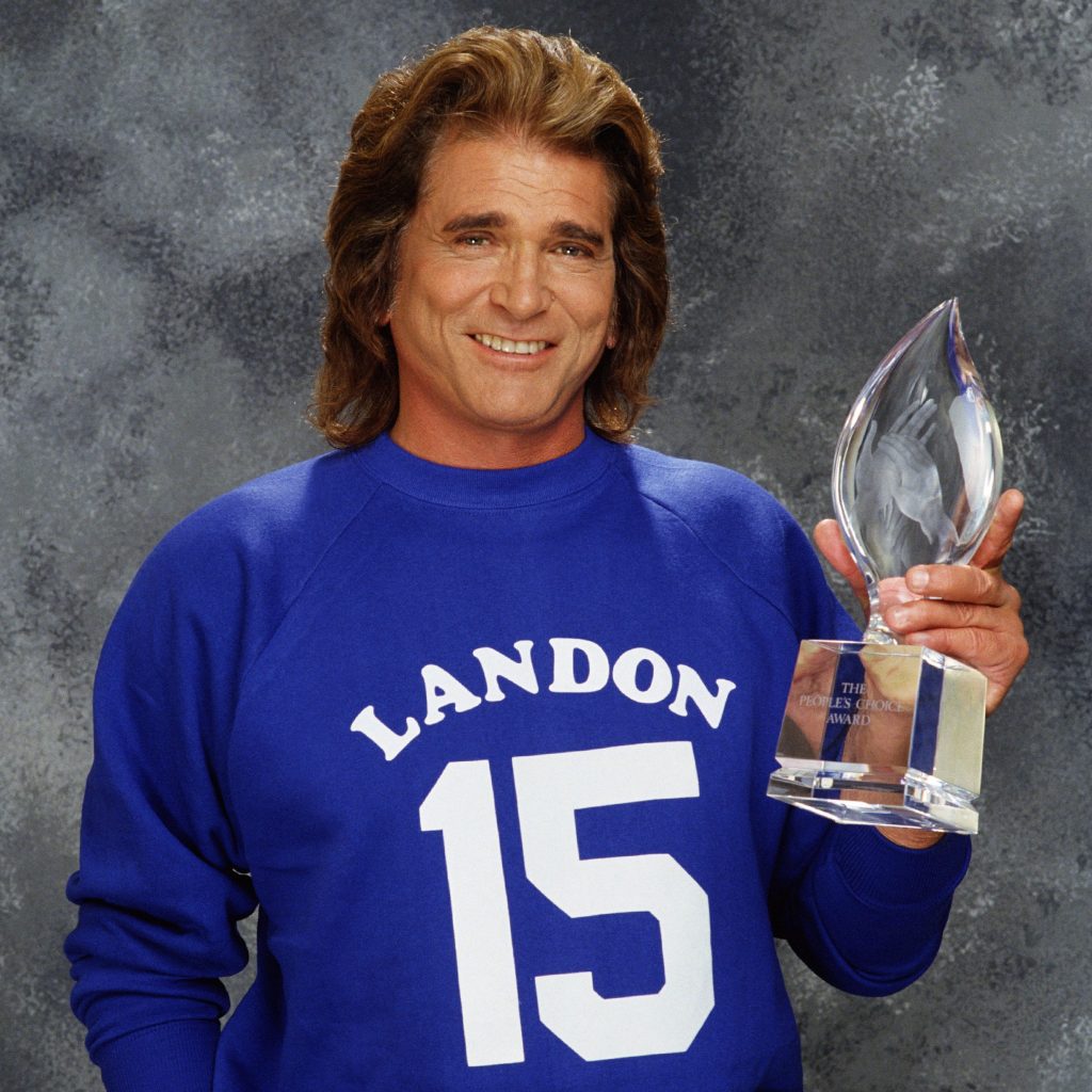 Michael Landon poses with the People's Choice Award, 1989