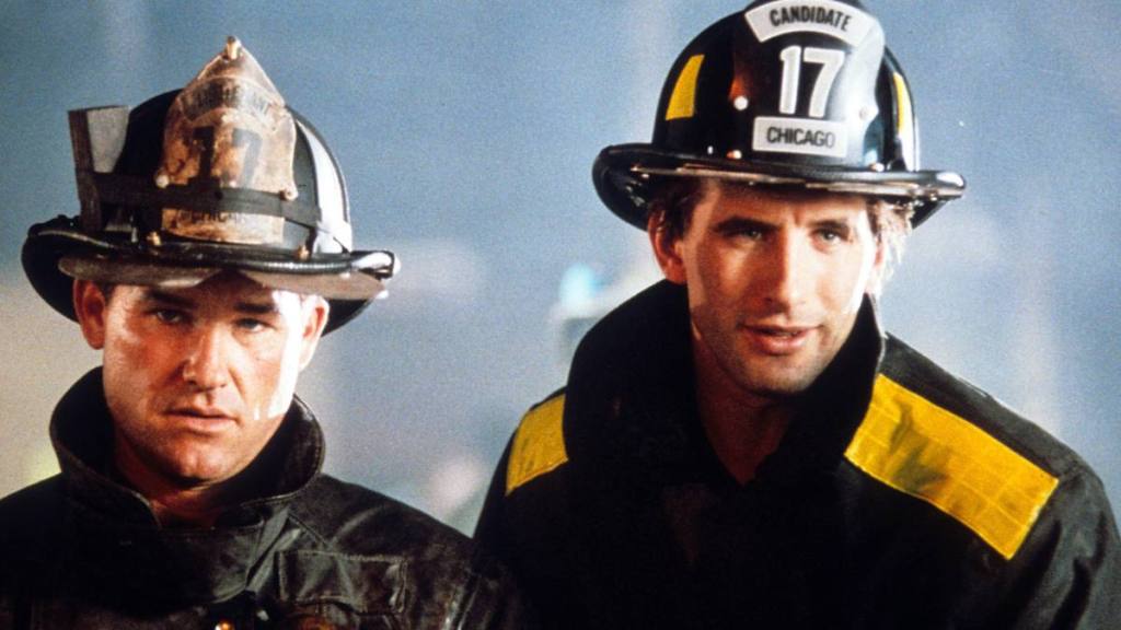 two men in firefighter outfits