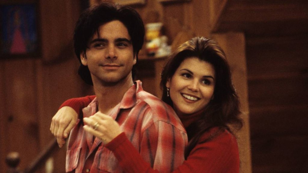 Woman hugging man; best tv couples