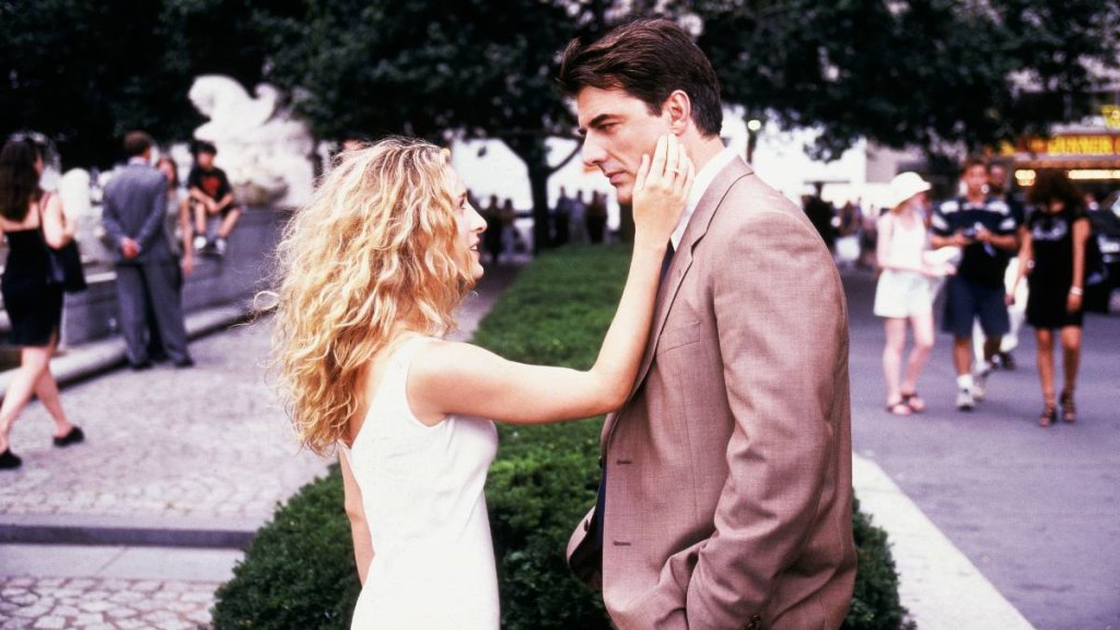 Woman caressing mans face; best tv couples