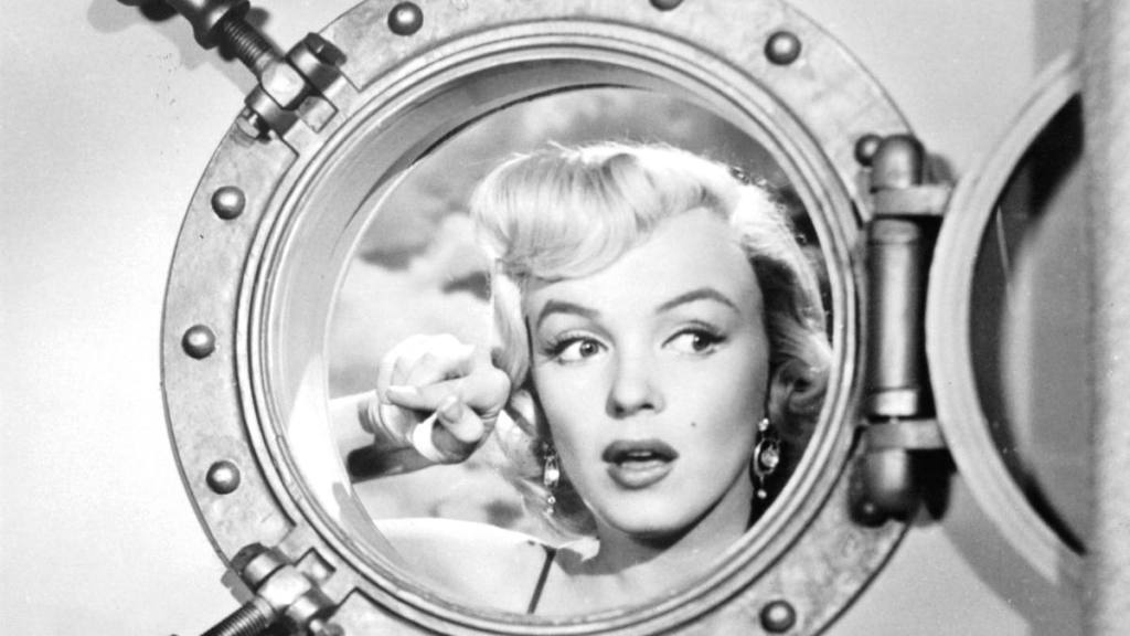 Marilyn Monroe looking out ship window in a scene from the film 'Gentlemen Prefer Blondes', 1953