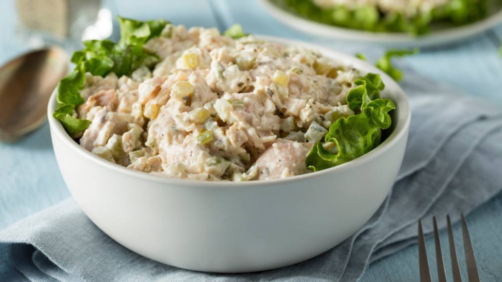 Homemade Healthy Chicken and spicefruit Salad in a Bowl