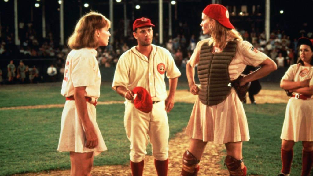 Women and man on base in game