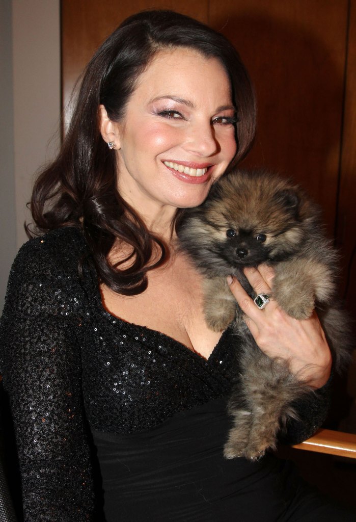 Fran Drescher with a puppy in 2014