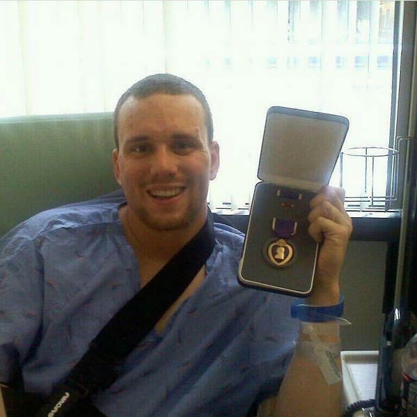 Scotty Hasting with his Purple Heart medal