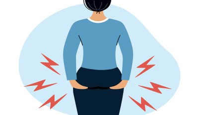 Woman experiencing hemorrhoids flare up.pg