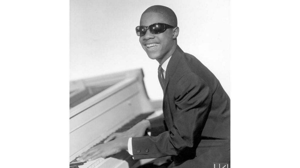 young man playing piano