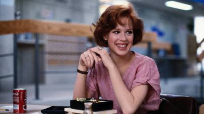 Woman smiling leaning on table; when harry met sally cast facts