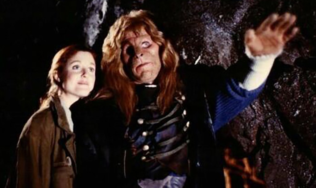 Jo Anderson and Ron Perlman in Beauty and the Beast, 1990