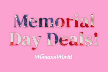 A pink background with red, white, and blue flag-inspired text that reads 'Memorial Day Deals!' with smaller text under it reading 'Woman's World.'
