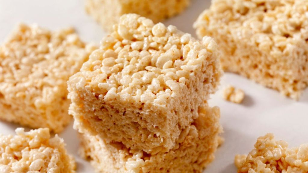 close up of microwave rice cereal treats on white background