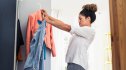 Woman cleaning out closet