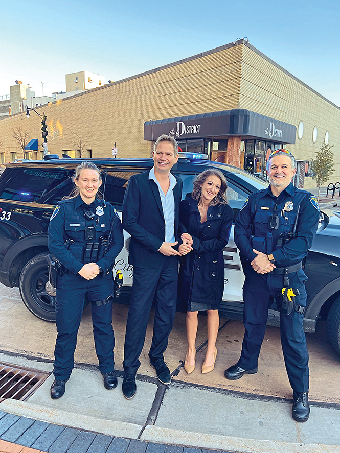 Troy and Moriah (center)with Officers Andersen (left) and Miller (right)