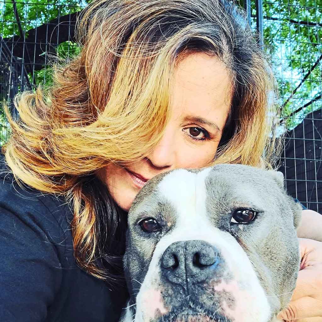 Annie with Tootsie, another dog she helped