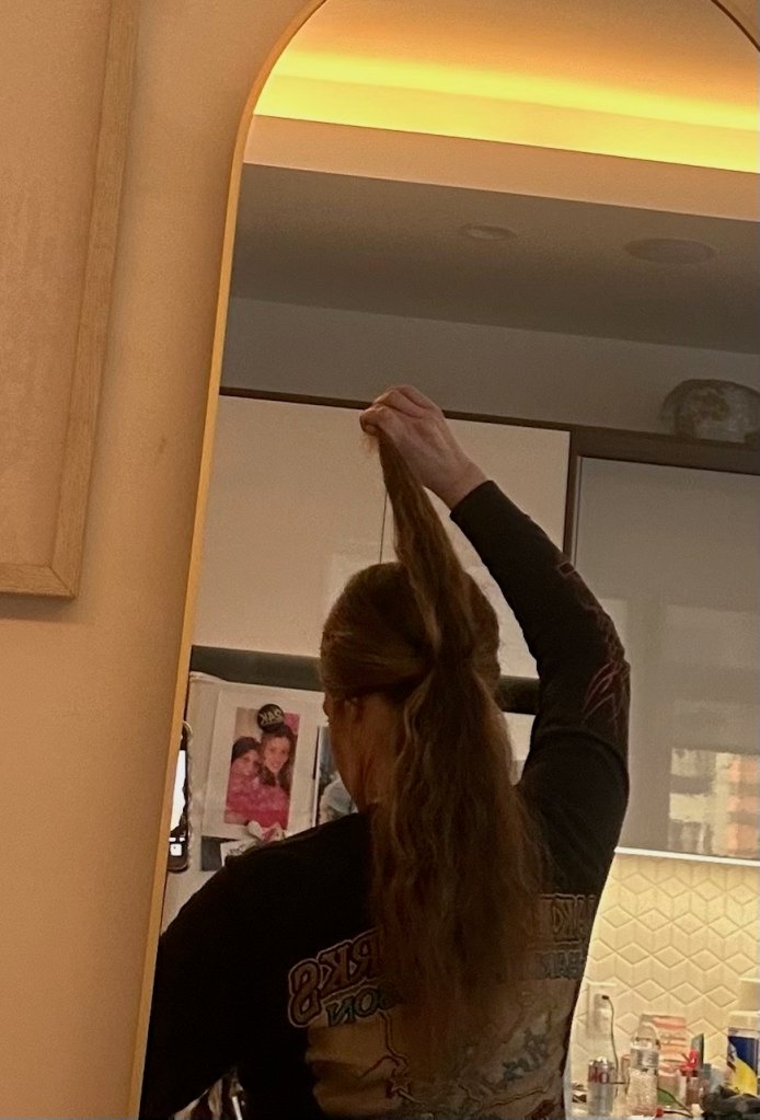 Hairstylist showing how to create heatless beach waves