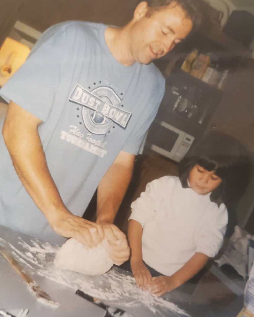 Rob teaching his daughter how to make biscuits, which he now does for his 'Dad, How Do I?' subscribers
