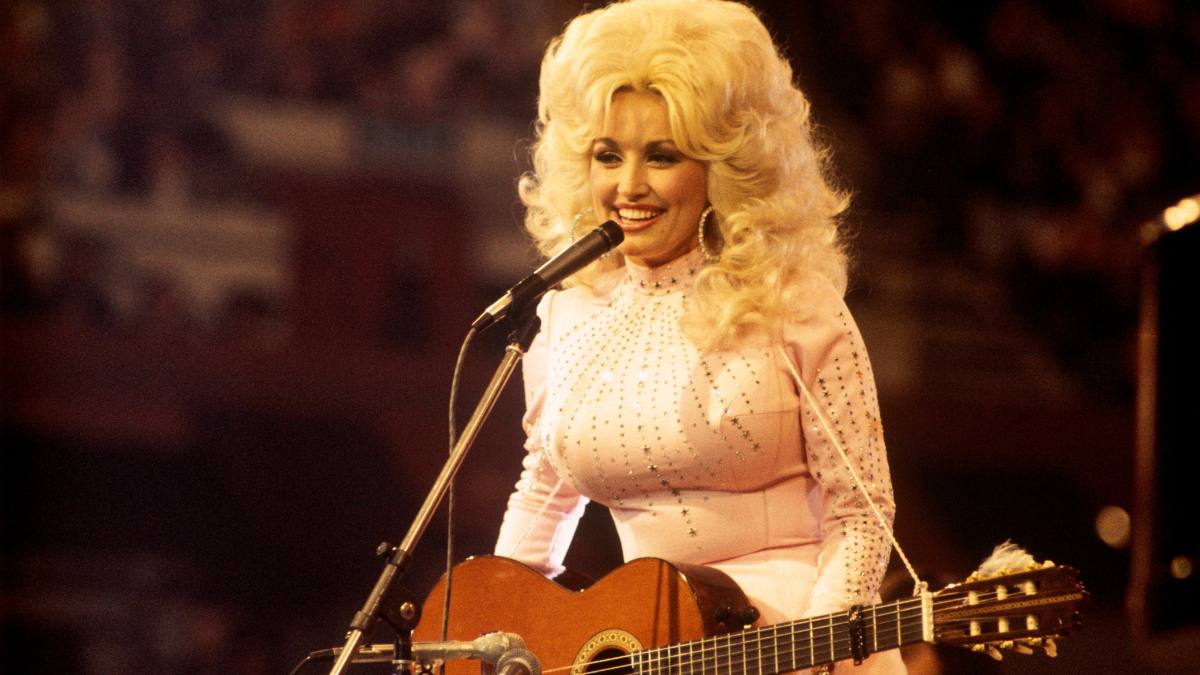 woman with guitar; dolly parton songs