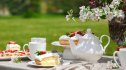 outside tea party table scape filled with bridgerton-inspired recipes