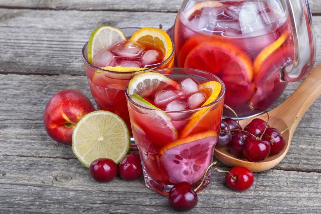 pitcher of berry punch and two glasses