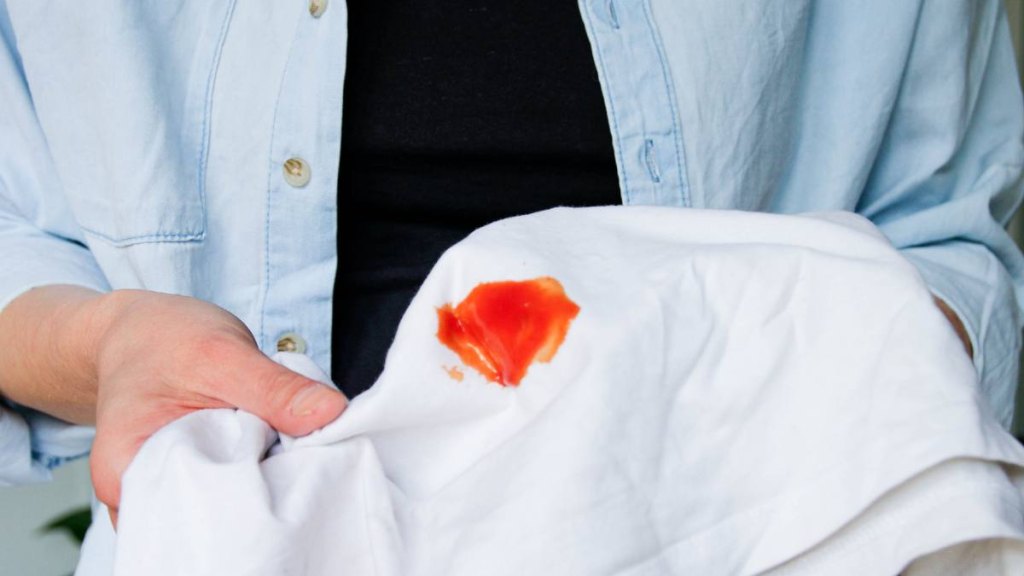 (fourth of july stains) Tomato ketchup red stain on a white t-shirt